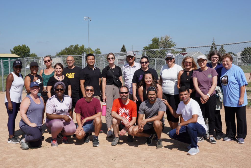 A team poses for a photo. 