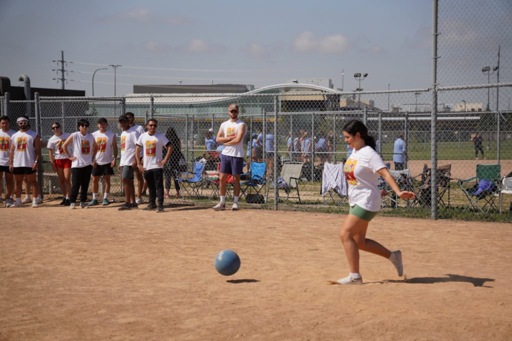 A person prepares to kick a ball. 