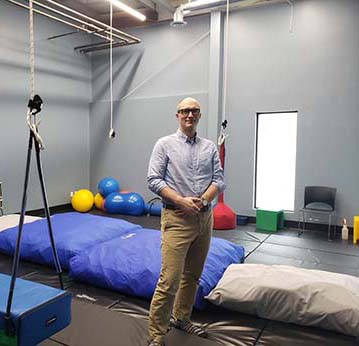 David Ambrose at an exercise room in his facility.