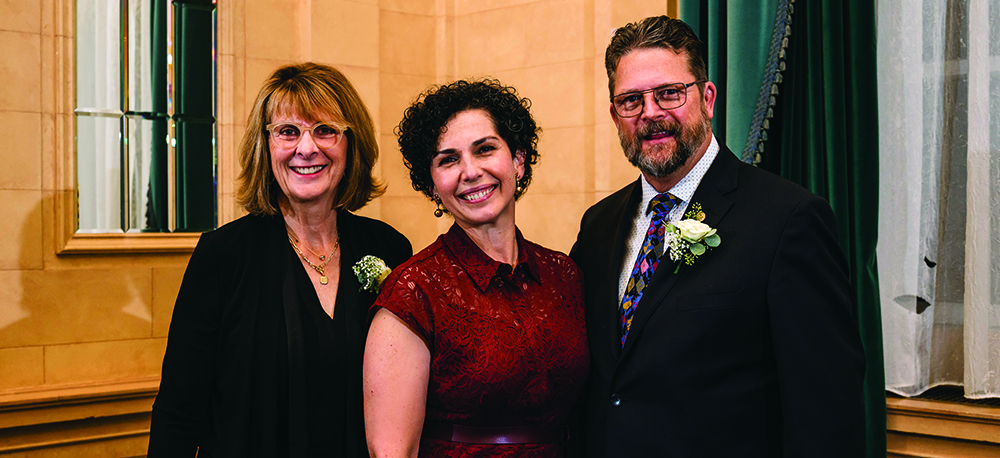 Anastasia Kelekis-Cholakis, dean of dentistry, with award winners Mickey Emmons Wener and Sandy Mutchmor.