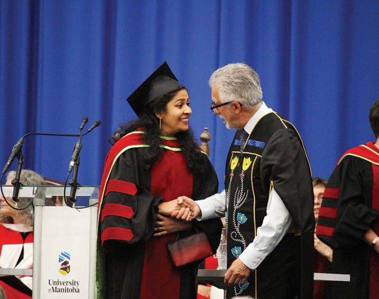 UM President and Vice-Chancellor Dr. Michael Benarroch congratulates Dr. Preetha Krishnan on receiving her PhD.