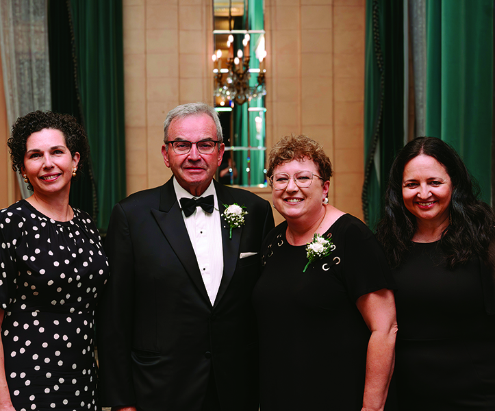 Dentistry dean Dr. Anastasia Kelekis-Cholakis, honoree Dr. Heinz Scherle, honoree Cindy Isaak-Ploegman and dental hygiene director Mary Bertone at the awards gala.