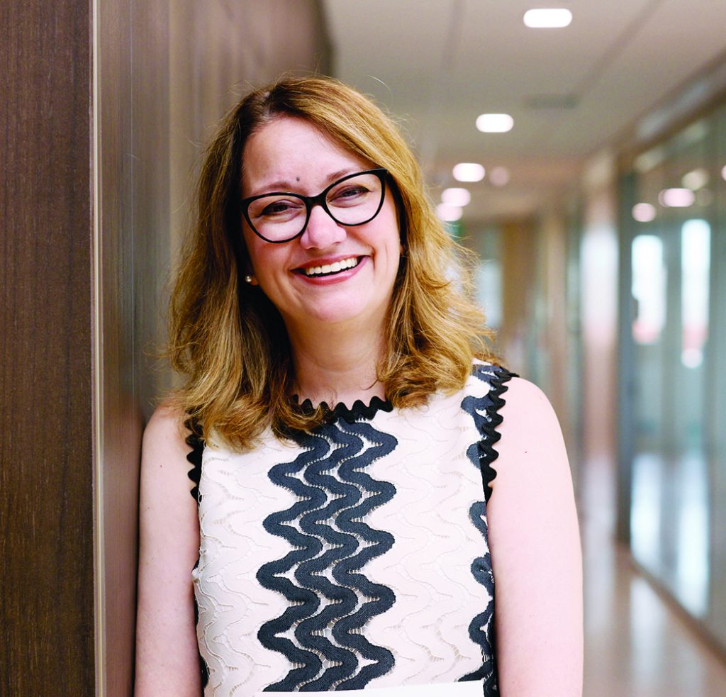 Sarah Forgie standing in a hallway.