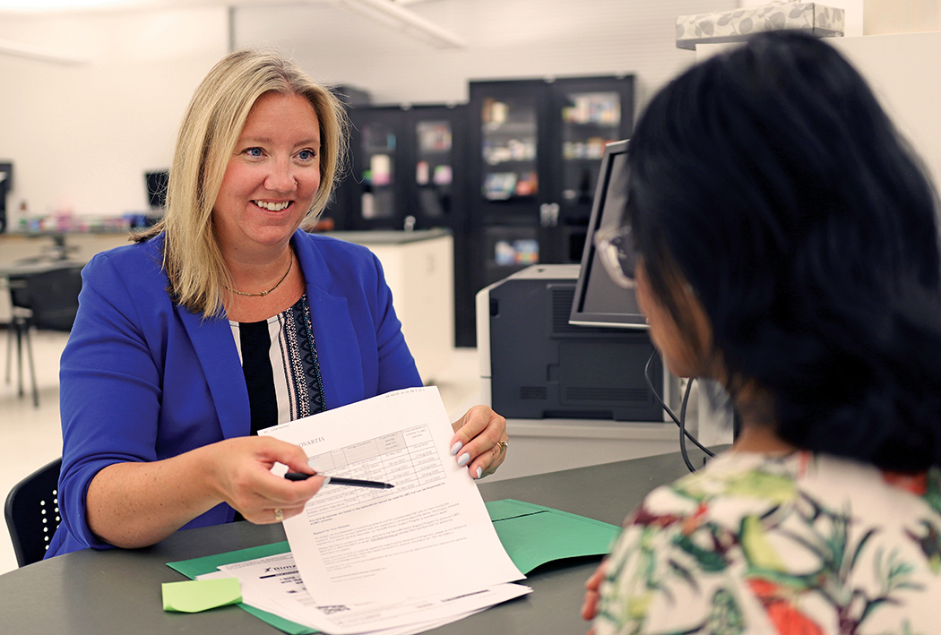 Britt Kural provides a travel consultation.