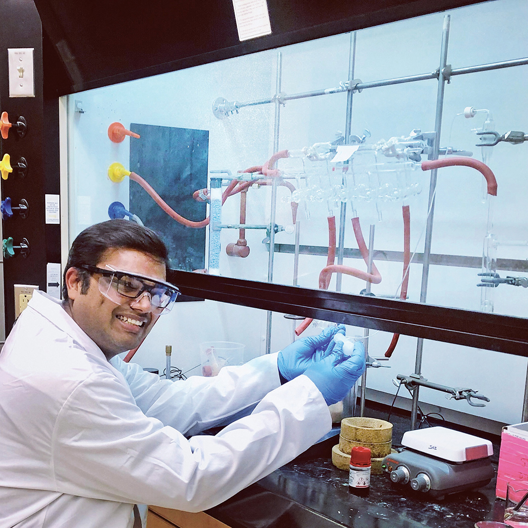 Nitesh Sanghai working in a lab.