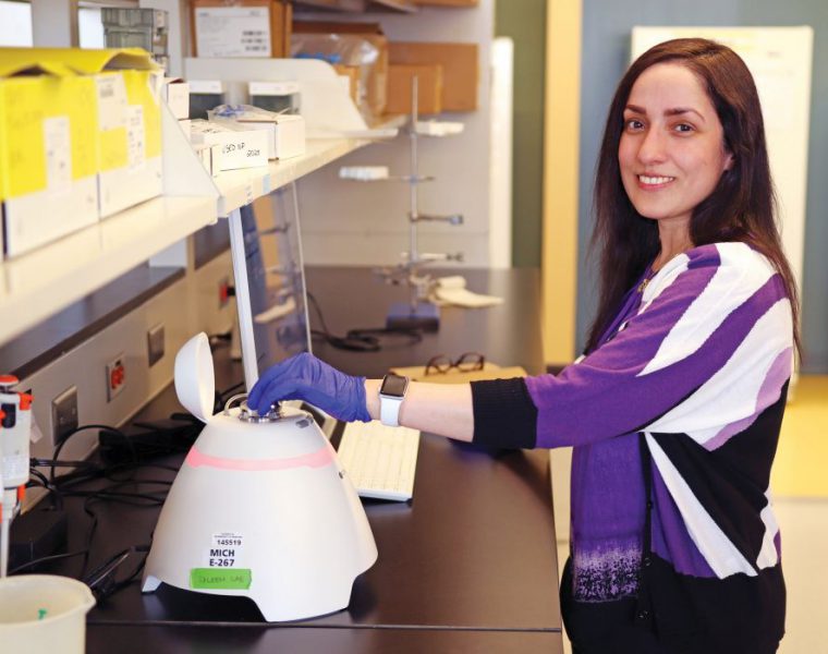 Dr. Ayesha Saleem with a machine called the Exoid.