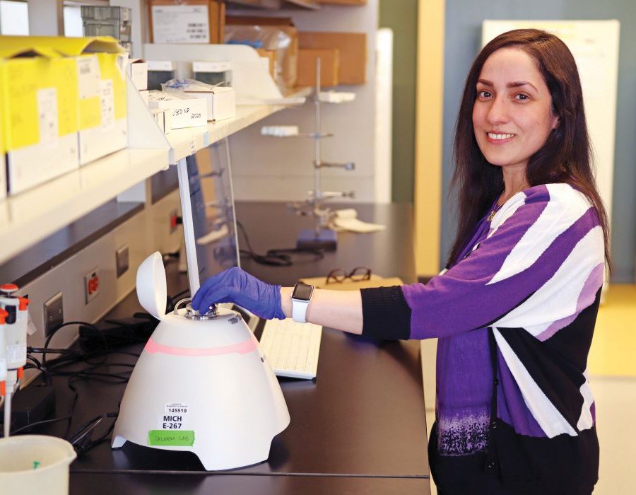 Dr. Ayesha Saleem with a machine called the Exoid.