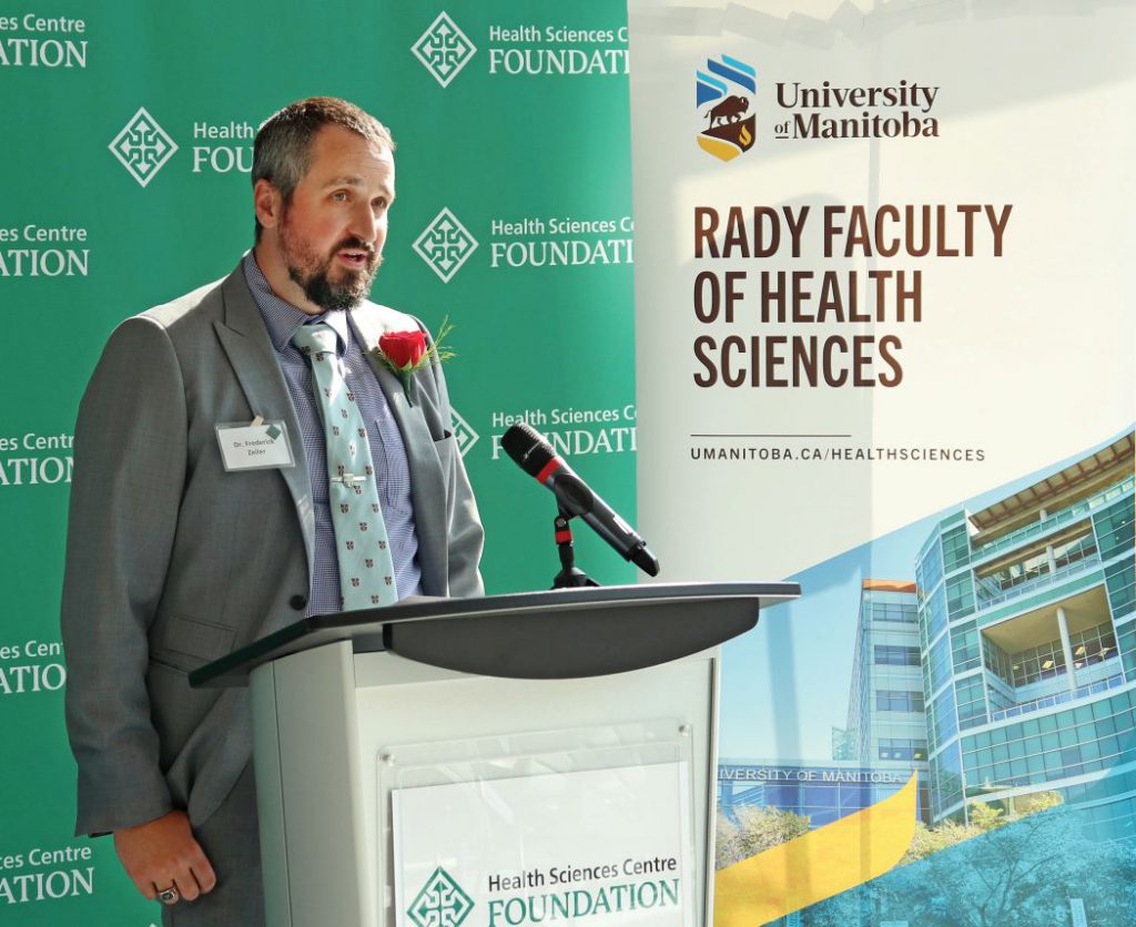 Frederick Zeiler speaks at a podium.