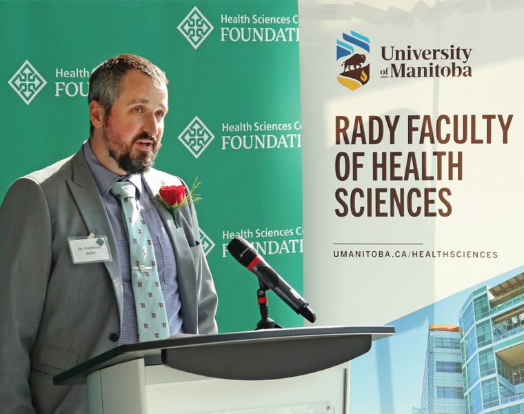 Frederick Zeiler speaks at a podium.