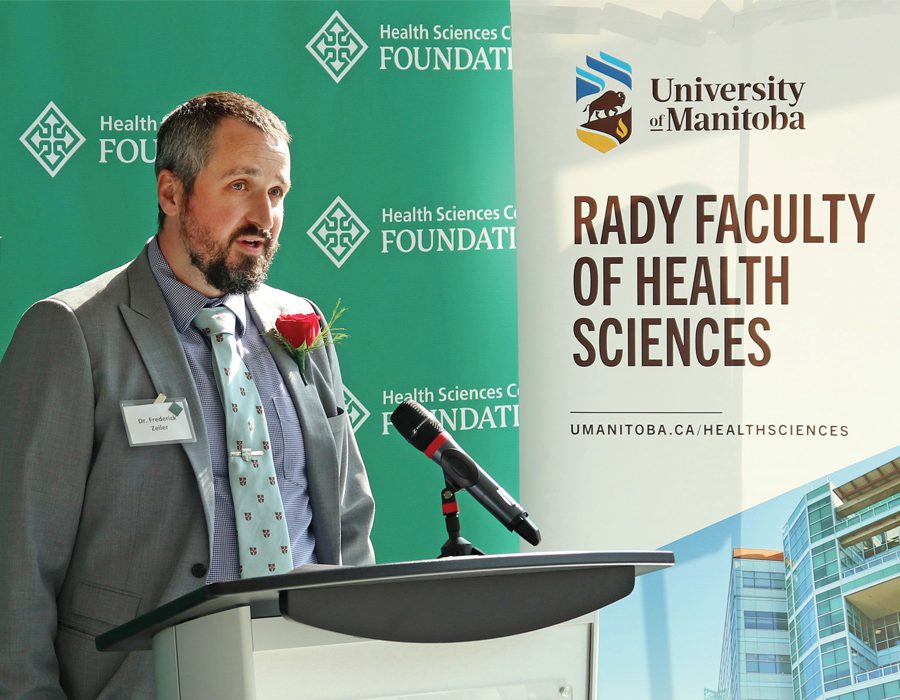 Frederick Zeiler speaks at a podium.